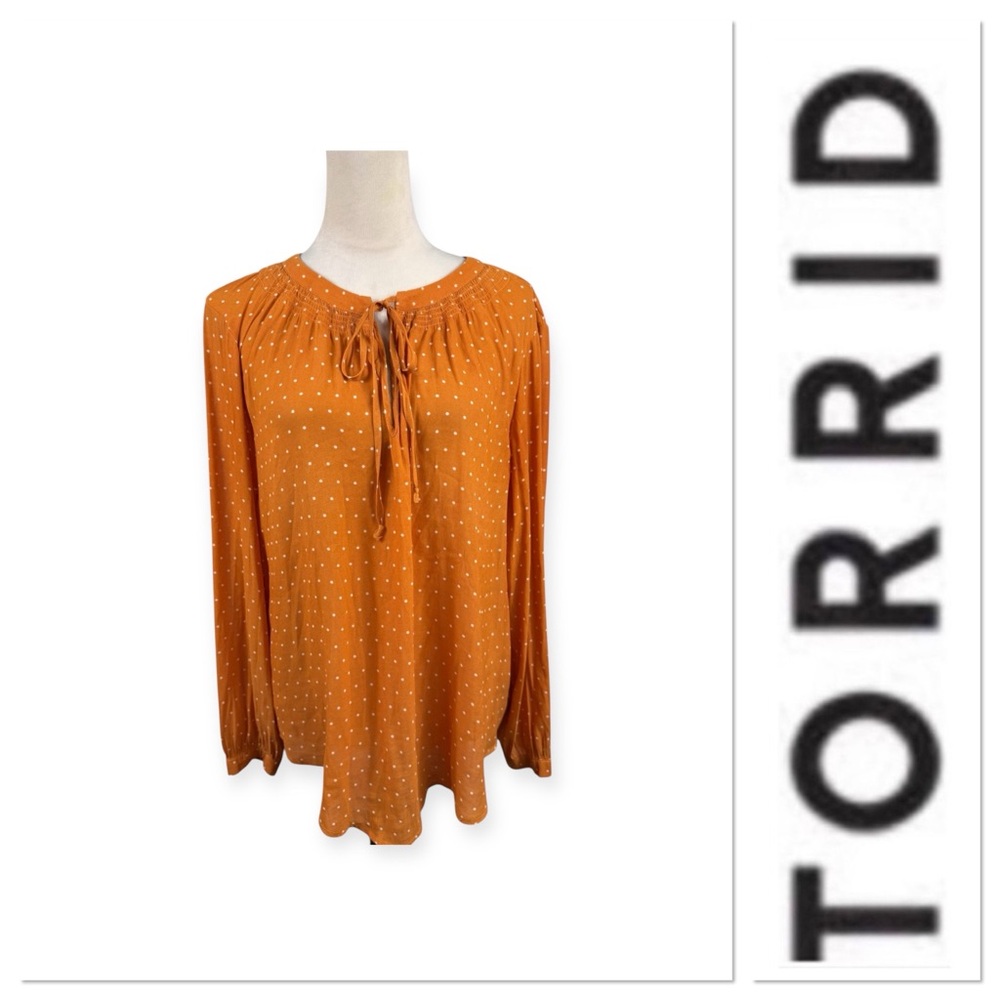 Torrid Orange top with white polka dots size 0-large/12